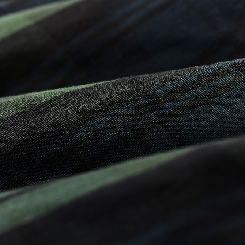 Women's dry waxed long cruiser von Filson | Black/ green plaid (Multicolour)