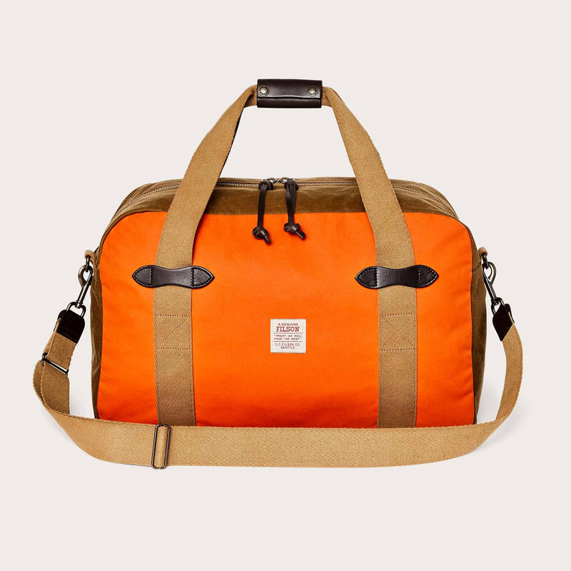 Medium tin cloth duffle bag di Filson | Dark tan / flame (Orange)