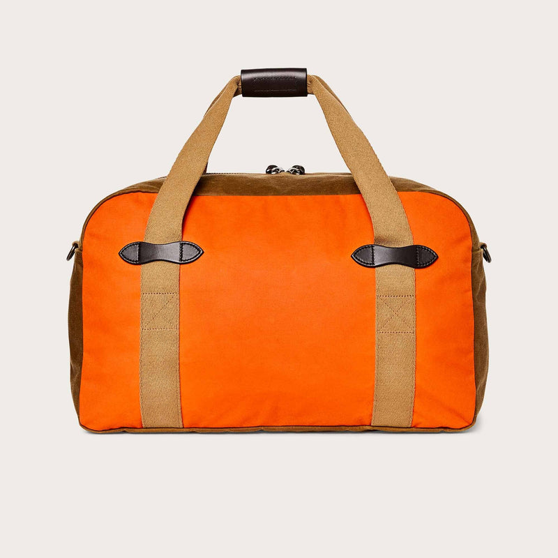 Medium tin cloth duffle bag di Filson | Dark tan / flame (Orange)