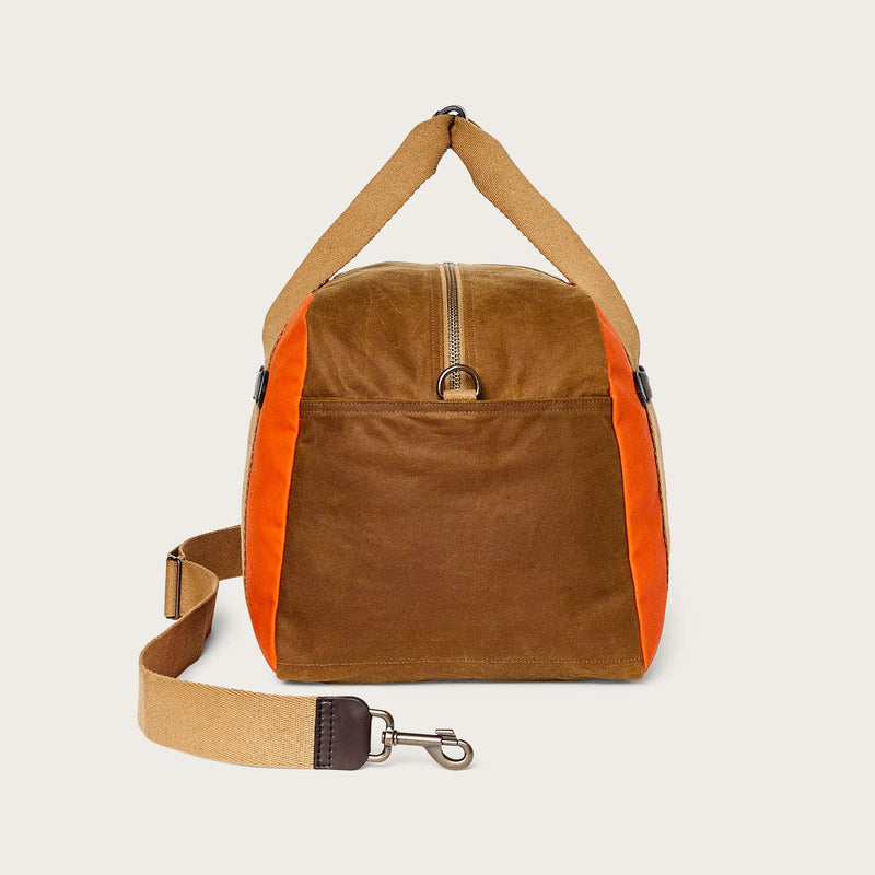 Medium tin cloth duffle bag di Filson | Dark tan / flame (Orange)